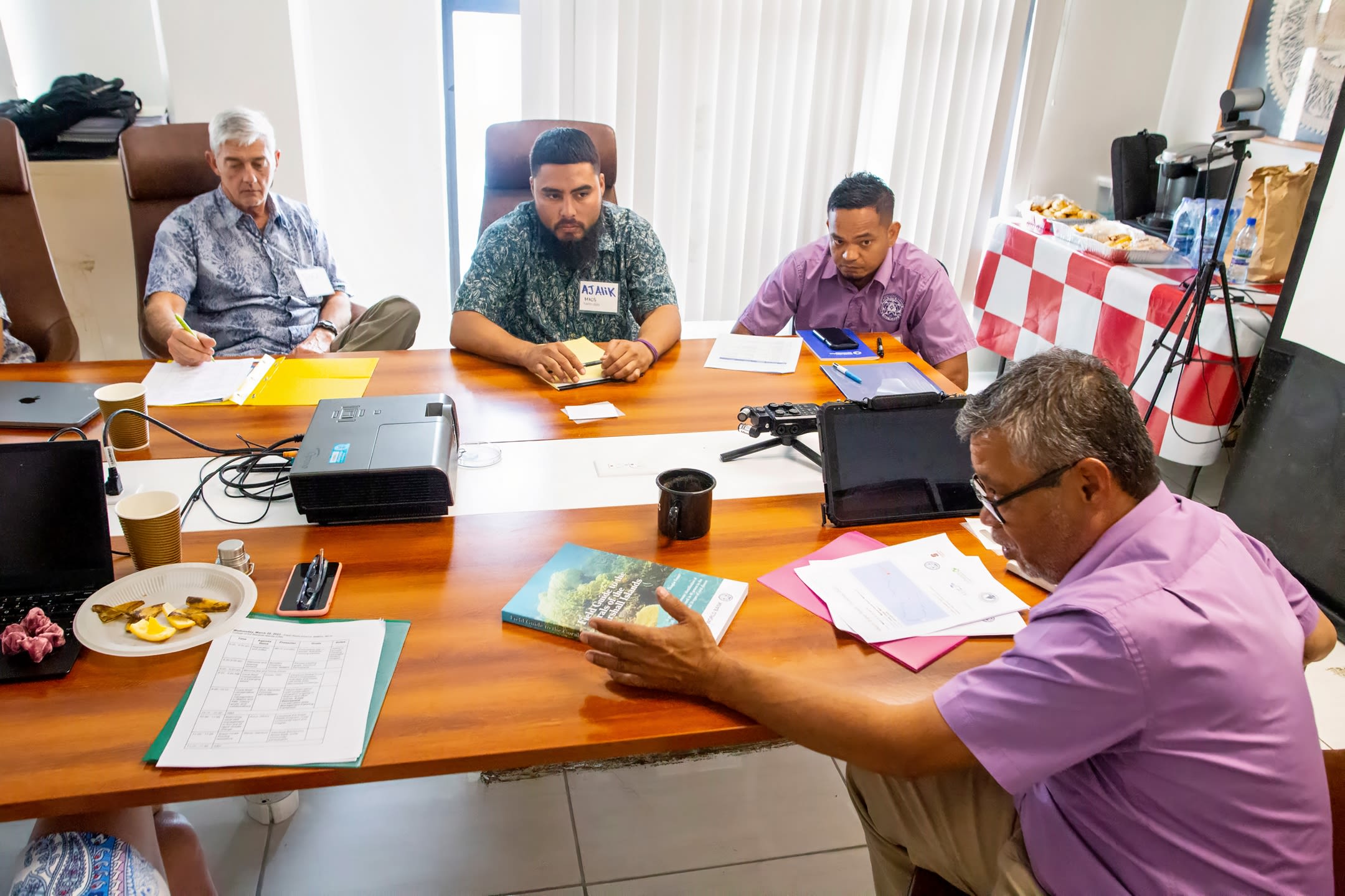 Stanford University marine biologist Dr. Steve Palumbi meets with multiple local government and conservation agencies to plan, set strategy, and acquire permits for heat-resistant coral project in Majuro, The Federation of the Marshall Islands.