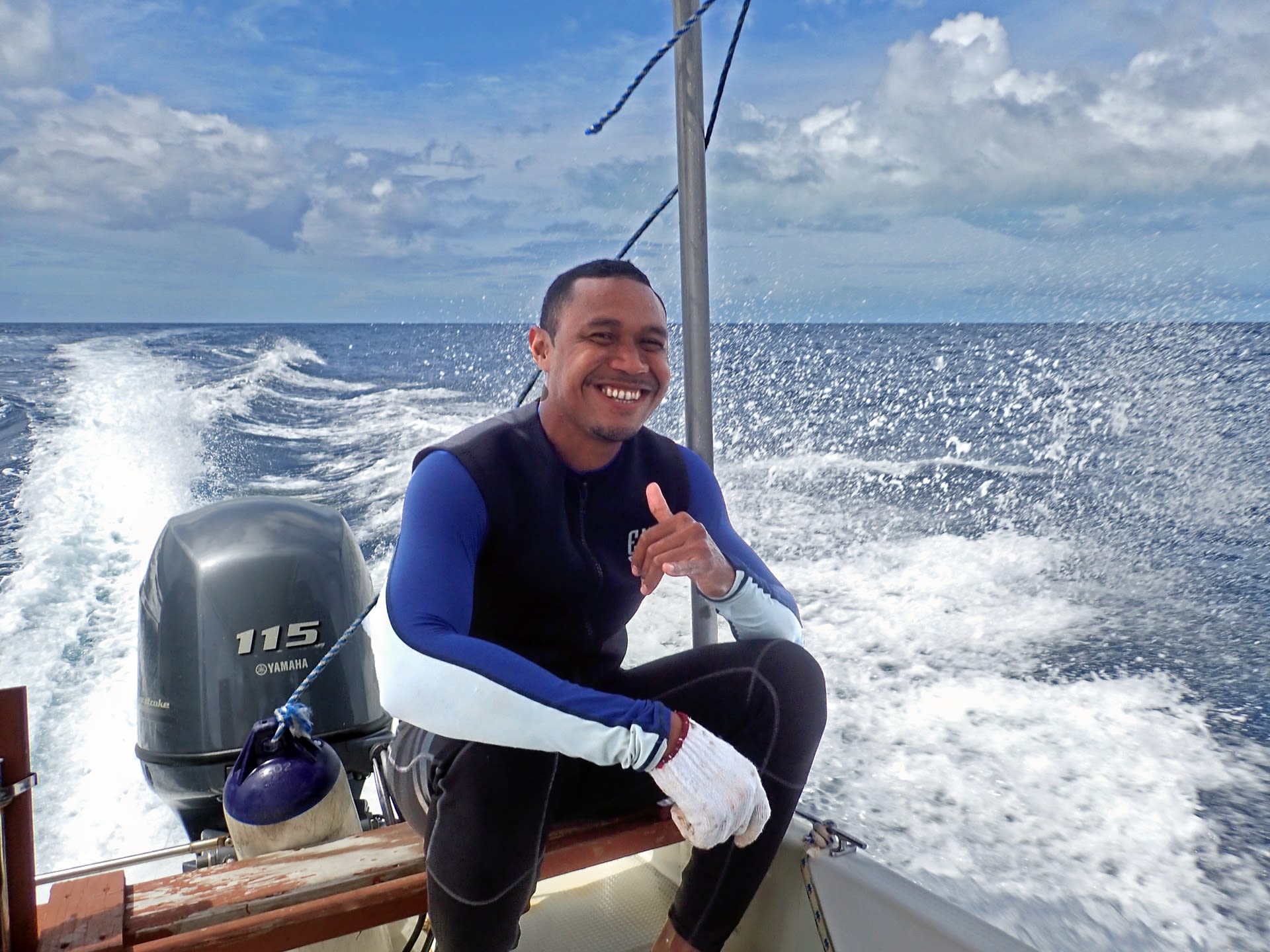 Lab and field technician from Palau International Coral Research Center returns from research dive in Palau.