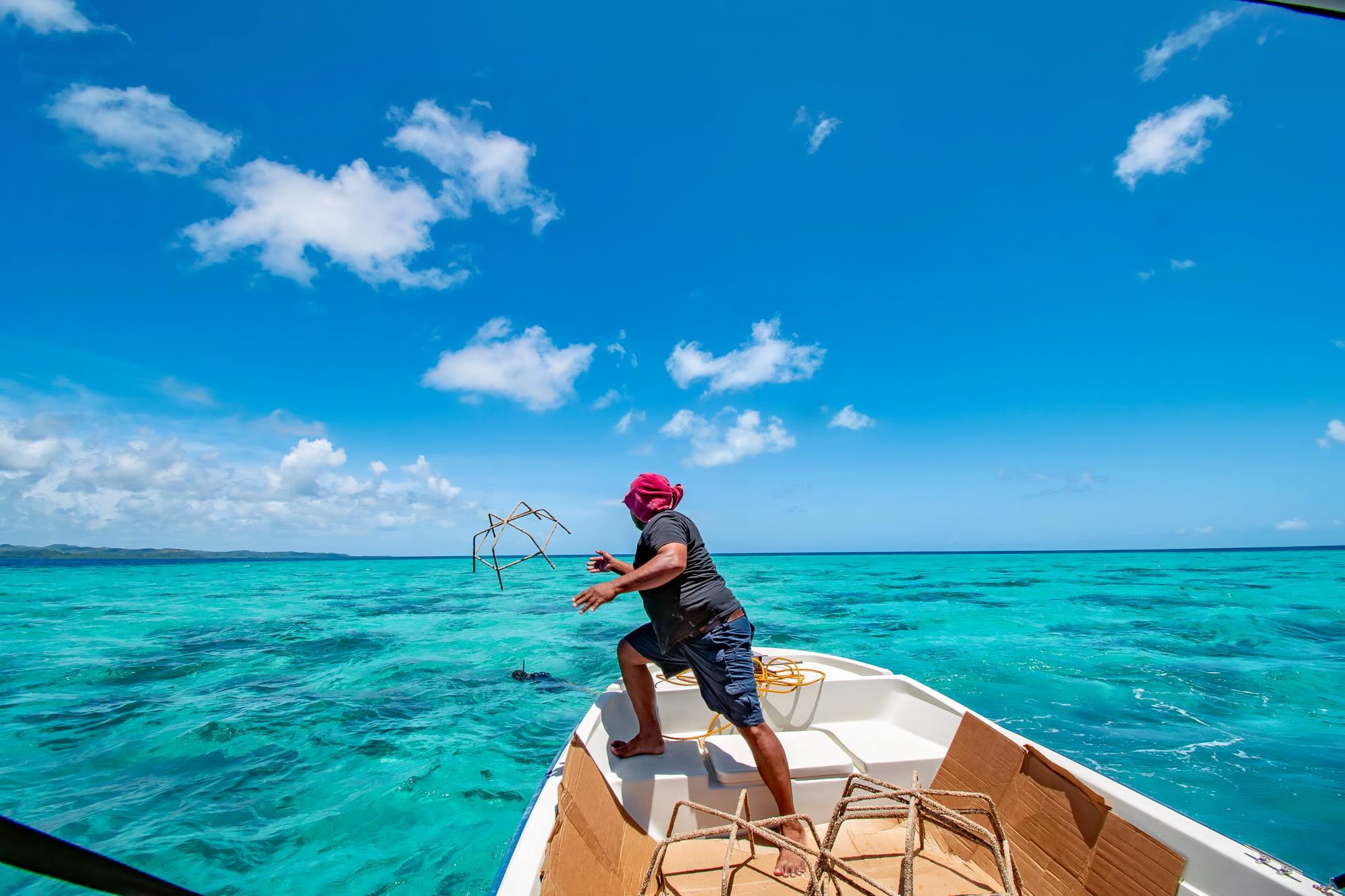 Palau Coral Champion unloads coral reef structures at nursery site in Palau.
