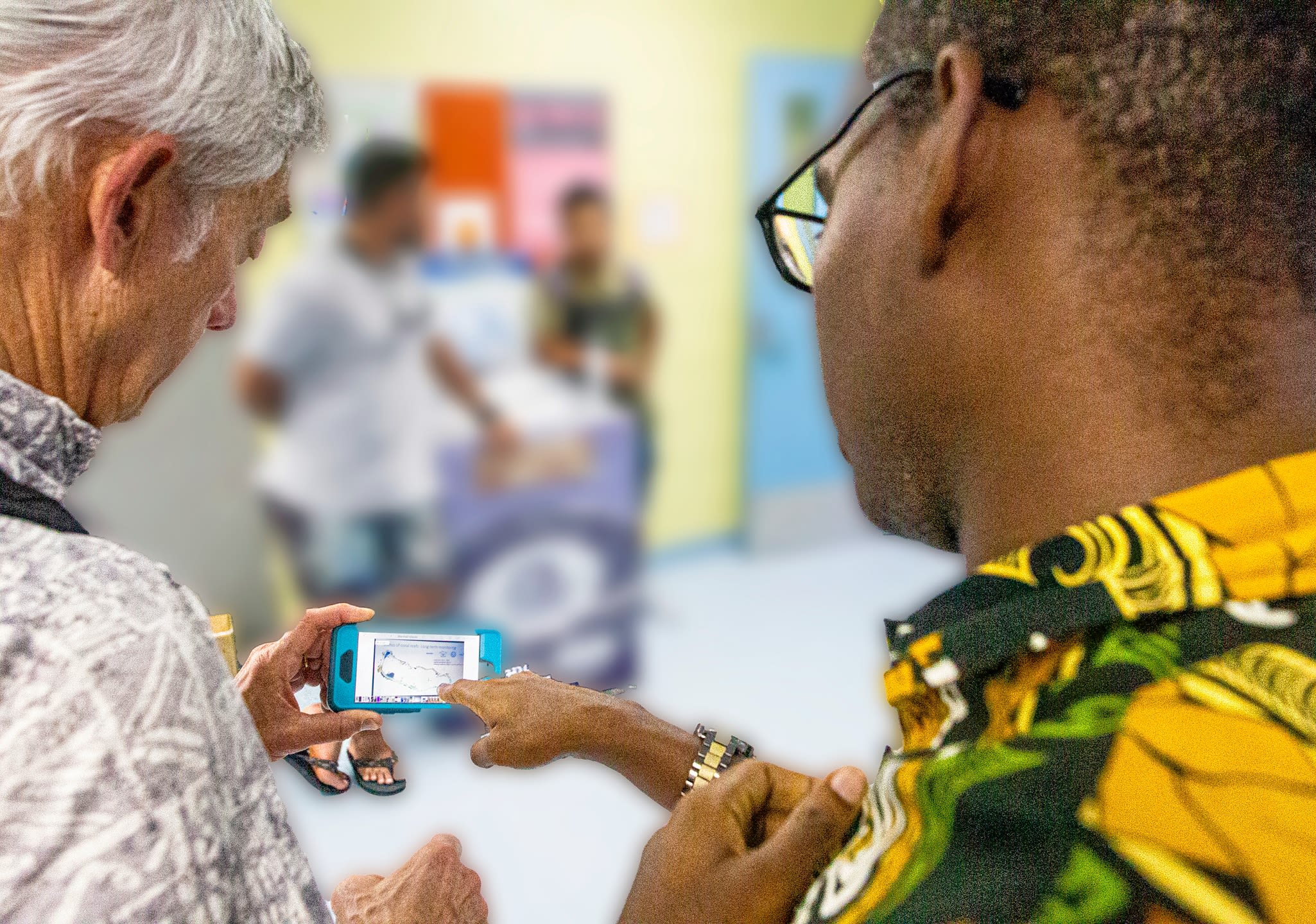 Stanford University marine biologist Dr. Steve Palumbi meets with College of the Marshall Islands professor to discuss project connections to the school in Majuro, The Federation of the Marshall Islands.